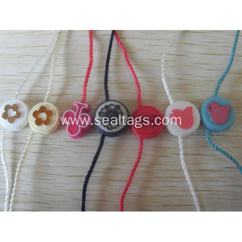 luggage labels with string and plastic bead